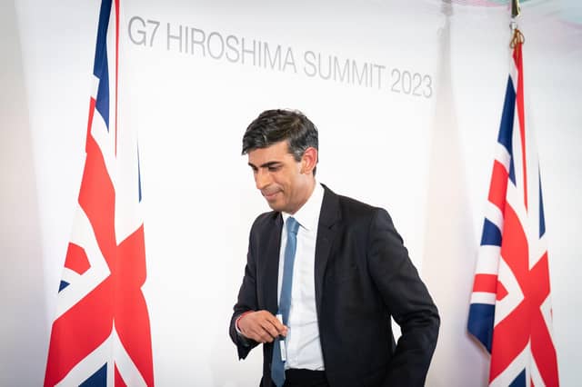 Prime Minister Rishi Sunak turns his back for five minutes at the G7 summit in Hiroshima, Japan, and yet another crisis erupts amongst his uncontrollable party. (Photo by Stefan Rousseau - WPA Pool/Getty Images)