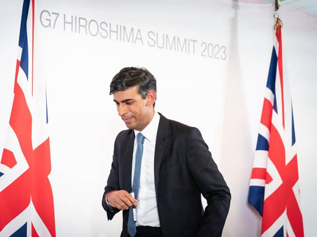 Prime Minister Rishi Sunak turns his back for five minutes at the G7 summit in Hiroshima, Japan, and yet another crisis erupts amongst his uncontrollable party. (Photo by Stefan Rousseau - WPA Pool/Getty Images)