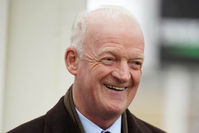 Winning smile: Trainer Willie Mullins after Lossiemouth won the Close Brothers Mares' Hurdle - one of three winners for the Cheltenham legend and his stable jockey Paul Townend.  Picture: Mike Egerton/PA Wire.RESTRICTIONS: Use subject to restrictions. Editorial use only, no commercial use without prior consent from rights holder.