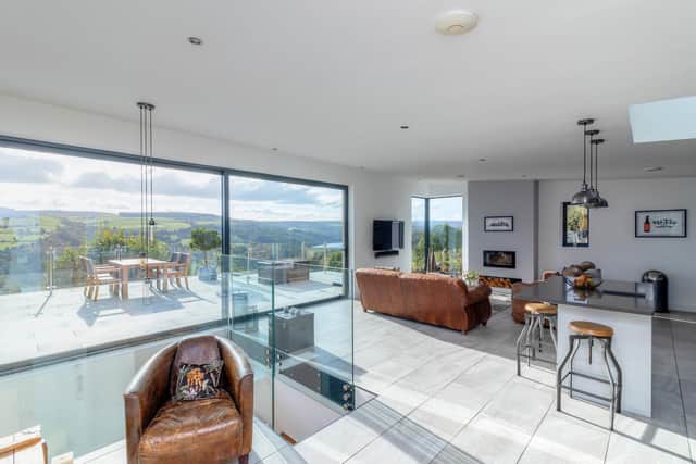 The upper floor with open plan living space and sensational views