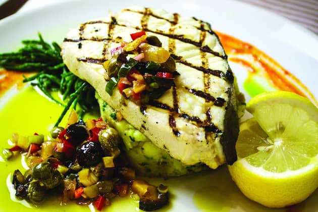 Chargrilled halibut with crushed potatoes and Mediterranean salsa, from William’s Food Hall, Stroud.