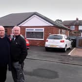 John and David Ledgard outside their parents' former home in Dewsbury earlier this year. It has now been confirmed they will receive all the money they are owed.