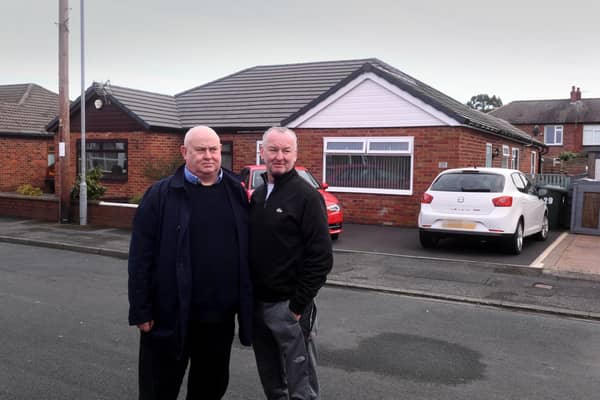 John and David Ledgard outside their parents' former home in Dewsbury earlier this year. It has now been confirmed they will receive all the money they are owed.