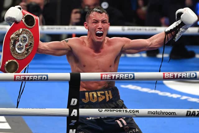 LEEDS, ENGLAND - MARCH 26: Josh Warrington celebrates after the IBF World Featherweight Title fight between Kiko Martinez and Josh Warrington at First Direct Arena on March 26, 2022 in Leeds, England. (Photo by Stu Forster/Getty Images)