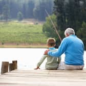 A generic photo of a granddad and grandson fishing. PIC: PA Photo/thinkstockphotos.