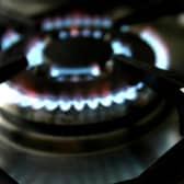 A gas hob with a bill from British Gas, whose owners, Centrica, reported record profits. PIC: PA