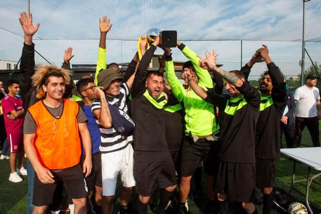 The Orchard Bradford team lift the trophy