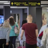 Passengers at Leeds Bradford Airport, which has been named the UK's worst airport for security queues. (Photo credit: Danny Lawson/PA Wire)