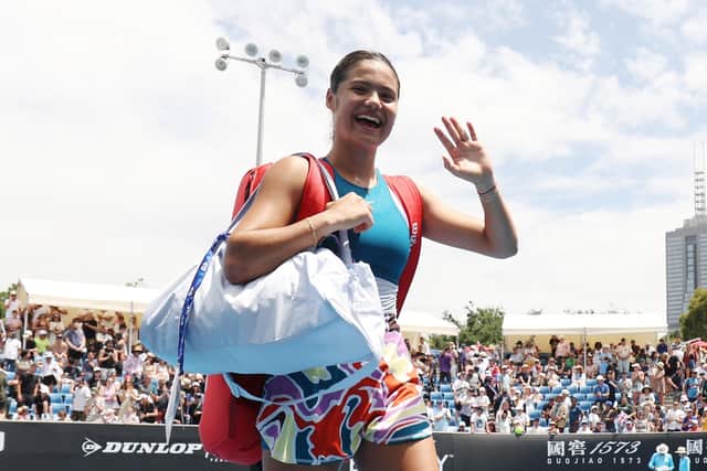 Golden smile: Emma Raducanu of Great Britain leaves the court after winning their round one singles match against Tamara Korpatsch of Germany during day one of the 2023 Australian Open. (Picture: Clive Brunskill/Getty Images)