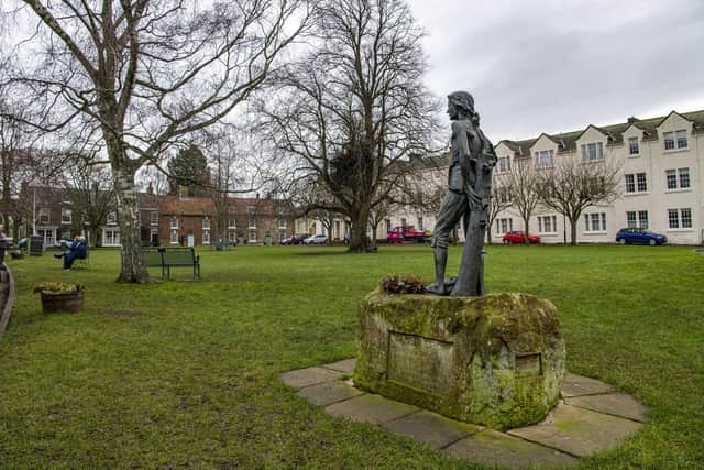 A statue depicting James Cook at the age of 16 looking towards Staithes where, according to tradition, he first felt the lure of the sea. This was commissioned by Hambleton District Council and is the work of sculptor Nicholas Dimbleby. Picture Tony Johnson