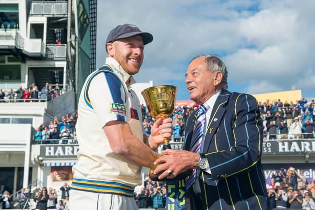 Dickie presents the 2015 County Championship trophy in his capacity as then Yorkshire president to former captain Andrew Gale. Picture by Allan McKenzie/SWpix.com