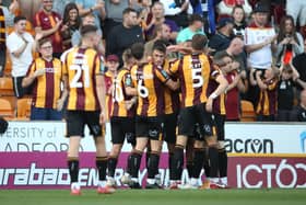 BRADFORD, ENGLAND - AUGUST 09: Andy Cook of Bradford City celebrates with teammates after scoring their side's first goal during the Carabao Cup First Round match between Bradford City and Hull City at University of Bradford Stadium on August 09, 2022 in Bradford, England. (Photo by George Wood/Getty Images)