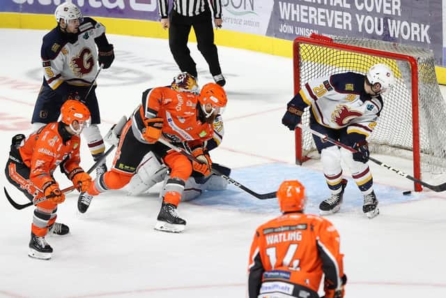 WE MEET AGAIN : Sheffield Steelers' Kevin Tansey (second left) in action against Guildford Flames in December. The two teams meet again at the Utilita Arena on Wednesday night in the Challenge Cup Final. Picture: Hayley Roberts/Steelers Media.