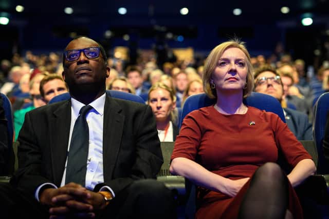 Chancellor of the Exchequer Kwasi Kwarteng (L) and Britain's Prime Minister Liz Truss at the annual Conservative Party conference. PIC: Leon Neal/Getty Images