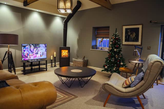 The cosy snug in Dexter with wood-burning stove