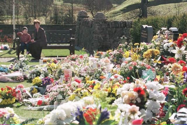A memorial at Dunblane, which opened on the second anniversary of the massacre in which 16 children and a teacher lost their lives. Photo by Chris Bacon/PA.