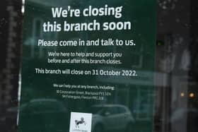 A bank closure sign at a Lloyds Bank, which has announced that further branches will be closing in April.