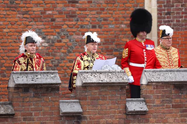 Garter Principle King of Arms, David Vines White (centre) reads the proclamation of new King, King Charles III, from the Friary Court balcony of St James's Palace, London, after King Charles III was formally proclaimed monarch. Charles automatically became King on the death of his mother, but the Accession Council, attended by Privy Councillors, confirms his role. Picture date: Saturday September 10, 2022.