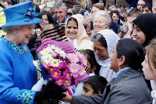 Britain's Queen Elizabeth II enjoys a walkabout in Wakefield city centre on March 24, 2005. PIC: JOHN GILES/AFP via Getty Images