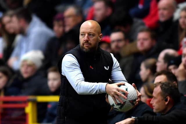 LONDON, ENGLAND - NOVEMBER 05: Manager of Charlton Athletic, Ben Garner catches the ball during the Emirates FA Cup First Round match between Charlton Athletic and Coalville Town at The Valley on November 05, 2022 in London, England. (Photo by Tom Dulat/Getty Images)