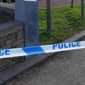 A woman has been seriously injured after being hit by a car outside Northern General Hospital. File picture of police tape