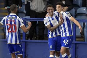 Sheffield Wednesday striker Bailey Cadamarteri (far right), pictured with team-mates Liam Palmer (centre) and Michael Ihiekwe (left).