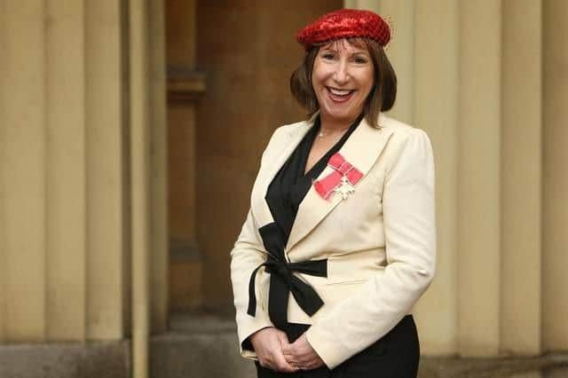 Kay Mellor wears her OBE at Buckingham Palace following the investiture ceremony.