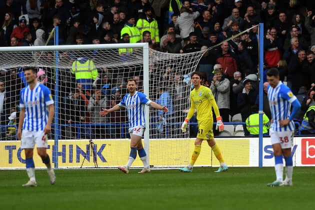 Huddersfield Town's dejected players after Coventry's third goal. Picture: Jonathan Gawthorpe