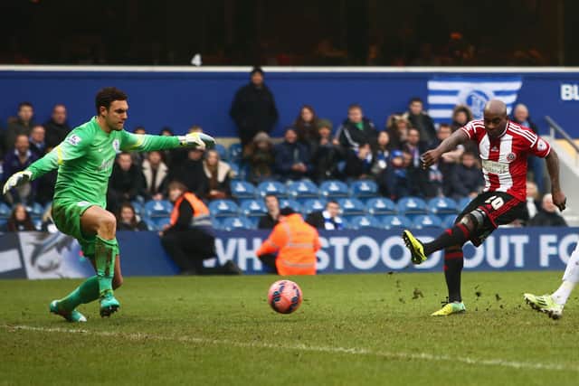 CREAM ON TOP: Jamal Campbell-Ryce of Sheffield United beats QPR goalkeeper Alex McCarthy to make it 3-0 at Loftus Road in January 2015 Picture: Jordan Mansfield/Getty Images