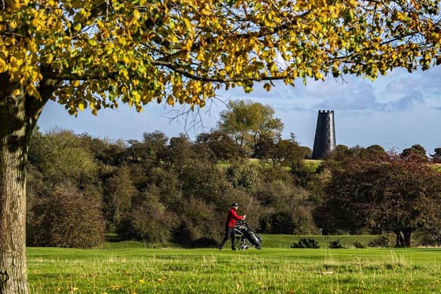 Golfers play on Beverley's Westwood Pasture with Black Mill in the background in glorious autumnal sunshine. (Pic credit: Tony Johnson)