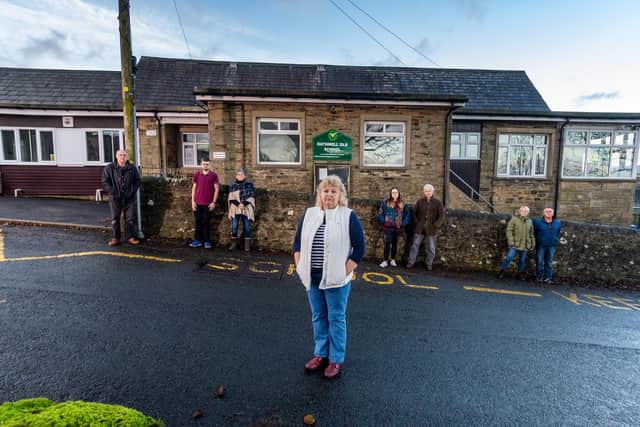 Rathmell Old School, Hesley Lane, Rathmell, near Settle, was closed back in 2017, and is presently run as a community centre for the residents of Rathmell. Pictured (Centre) Jacky Frankland, Rathmell School Trustee & Treasurer, with a number of the residents who are opposed about the changes (left to right) Keith Mothersdale, Jonathan Booth, (Former Pupil), Linda Brennand, Grace Currie, (Former Pupil), Stuart Currie, (Former Pupil), and Christine and Mark Chandley.