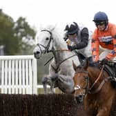 Poised: Gentlemansgame ridden by Darragh O'Keeffe, left,  on his way to winning the bet365 Charlie Hall Chase at Wetherby.
Picture: Nigel French/PA Wire.