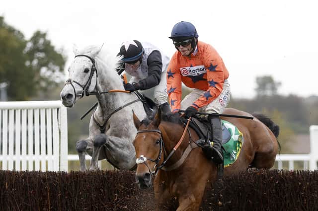 Poised: Gentlemansgame ridden by Darragh O'Keeffe, left,  on his way to winning the bet365 Charlie Hall Chase at Wetherby.
Picture: Nigel French/PA Wire.
