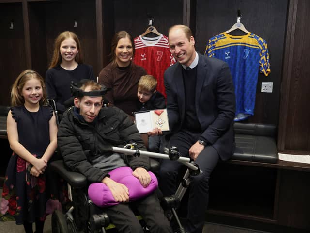 The Prince of Wales meets Rob Burrow, his wife Lindsey Burrow and their children during a visit to Headingley Stadium, Leeds, to award him a Commander of the Order of the British Empire (CBE). PIC: Phil Noble/PA Wire