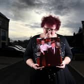Claire Throssell with a picture of her sons Paul and Jack. PIC: Simon Hulme