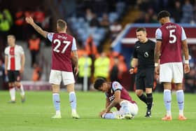 Boubacar Kamara of Aston Villa reacts after picking up an injury against Southampton. Picture: Catherine Ivill/Getty Images.