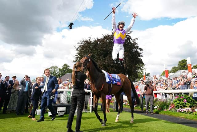 PAY DAY: Frankie Dettori celebrates winning the Sky Bet City Of York Stakes on Kinross during day four of the Ebor Festival at York Racecourse. Picture: Mike Egerton/PA