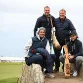 Joe Root, right, poses with, from left, Kevin Pietersen, Michael Vaughan and Piers Morgan on the Swilcan Bridge during 'The Hickory Challenge' prior to the Alfred Dunhill Links Championship on the Old Course in St Andrews, Scotland. Photo by Jan Kruger/Getty Images.