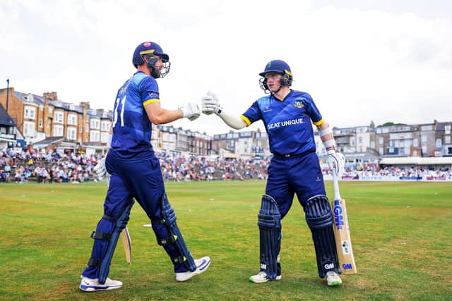 Will Fraine, left, and Harry Duke will be hoping to entertain the Scarborough crowd again when Yorkshire head back to the seaside next year. Picture by Alex Whitehead/SWpix.com