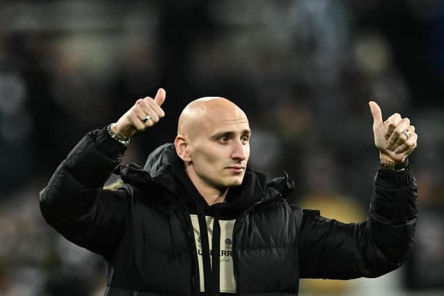 English midfielder Jonjo Shelvey salutes Newcastle United's fans as he prepares to leave the club for Nottingham Forest, during the English League Cup semi final football match between Newcastle United and Southampton at St James's Park stadium in Newcastle, on January 31, 2023. (Photo by PAUL ELLIS/AFP via Getty Images)