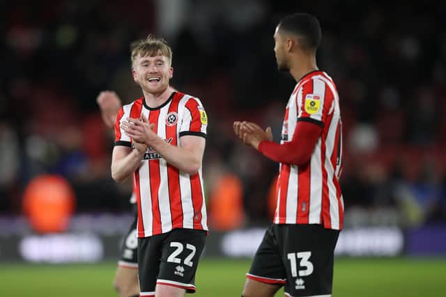 Sheffield United's Tommy Doyle (left) applauds the fans after the final whistle of the Sky Bet Championship match at Bramall Lane. Picture: Isaac Parkin/PA Wire.