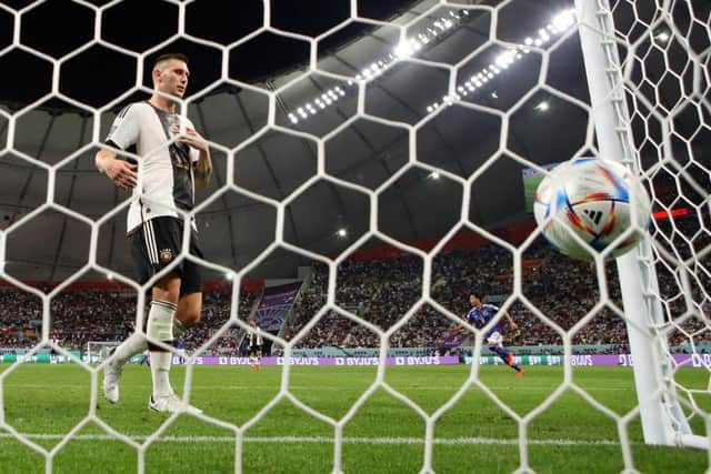 SHOCK DEFEAT: Germany's Niklas Suele after Takuma Asano scores Japan's second goal in one of the tournaments big shocks