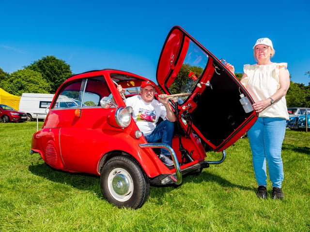 Classic Car enthusiasts Mick and Annette Connaughton, of Darlington, with their 1960 BMW Isetta. Picture By Yorkshire Post Photographer, James Hardisty