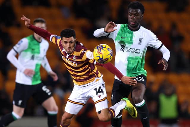 Bradford City's Tyler Smith battles for possession with Liverpool under-21s' player Amara Nallo during the Bristol Street Motors Trophy match at Valley Parade. Picture: George Wood/Getty Images.