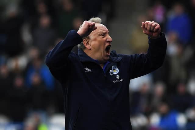 DELIGHT: Neil Warnock celebrate Huddersfield Town's second goal, scored by Jaheim Headley