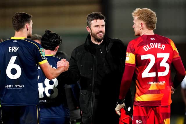 GOOD SHOW, LADS: Middlesbrough manager Michael Carrick (centre) speaks to goalkeeper Tom Glover (right) and Dael Fry at the end of the Carabao Cup quarter final match at Vale Park. Picture: Nick Potts/PA