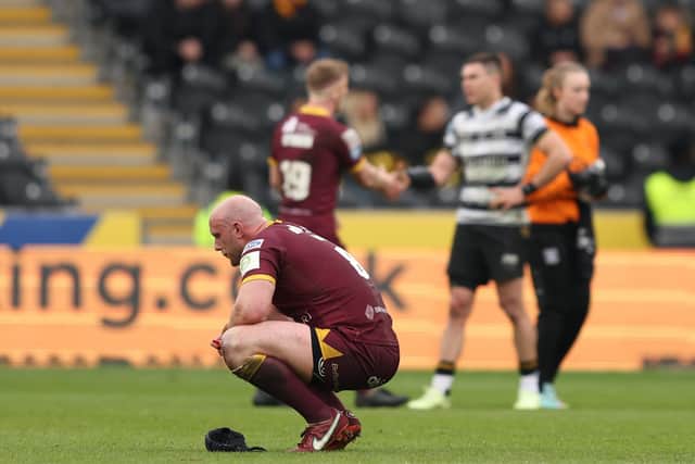 Chris Hill appears dejected after the defeat to Hull FC. (Photo: John Clifton/SWpix.com)