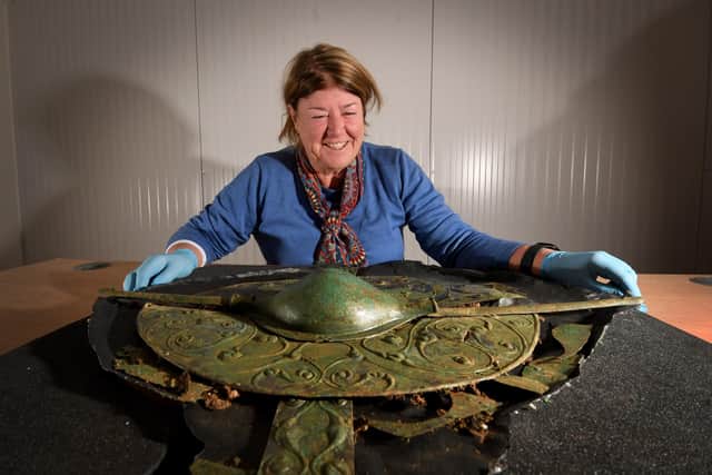 Archaeologist Paula Ware with the shield she dug up in Pocklington  pictured at MAP, Malton, North Yorkshire. Picture by Simon Hulme 14th February2023