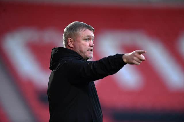 Doncaster Rovers manager Grant McCann urges on his players in Tuesday's EFL Trophy game against Huddersfield Town. Picture: Jonathan Gawthorpe