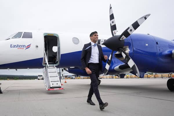Prime Minister Rishi Sunak arrives at Inverness Airport, Scotland, while on the General Election campaign trail. PIC: Stefan Rousseau/PA Wire